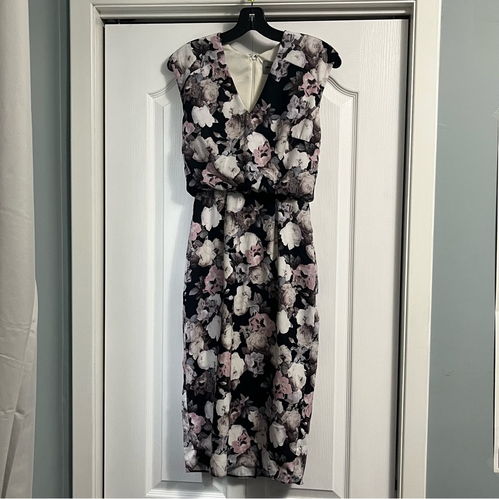 ASOS sleeveless black dress featuring pastel floral pattern size 4 garden girl